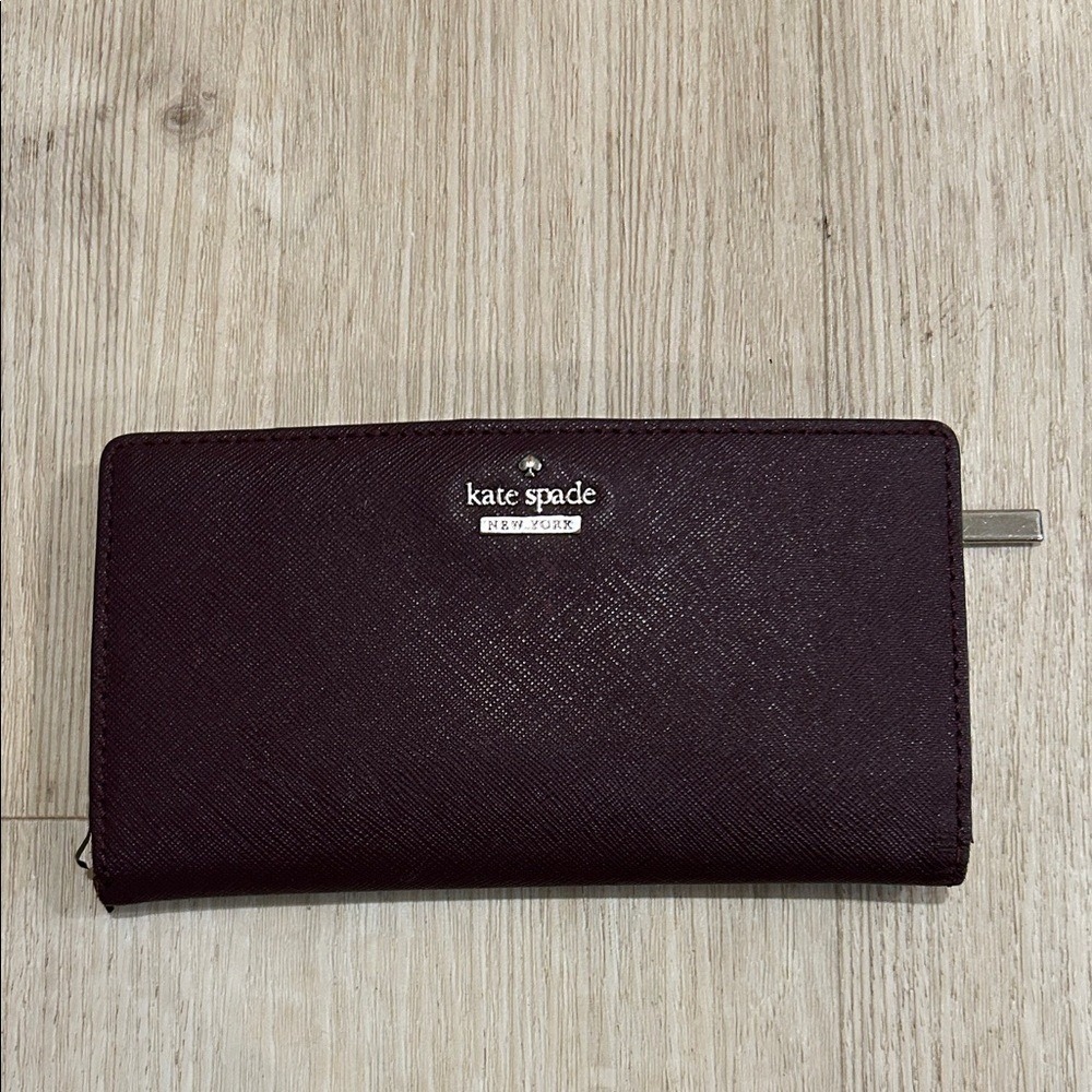 kate spade Plum Saffiano Zip Around Wallet with Silver Logo